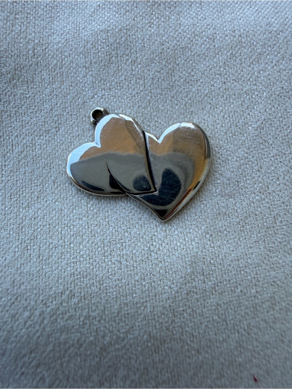 Retired double heart charm